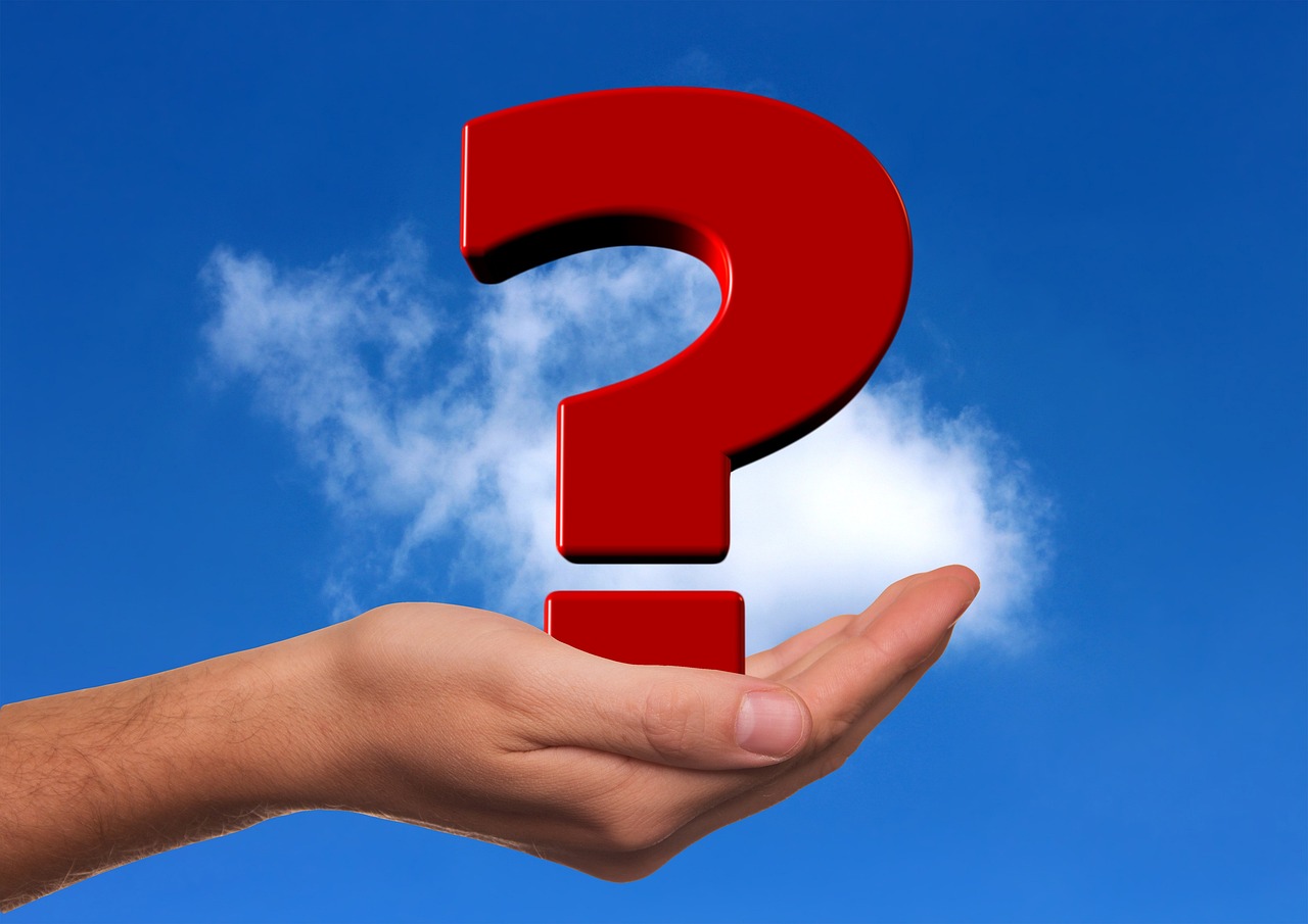 Hand holding question mark representing key facts about motor vehicle accidents in South Africa